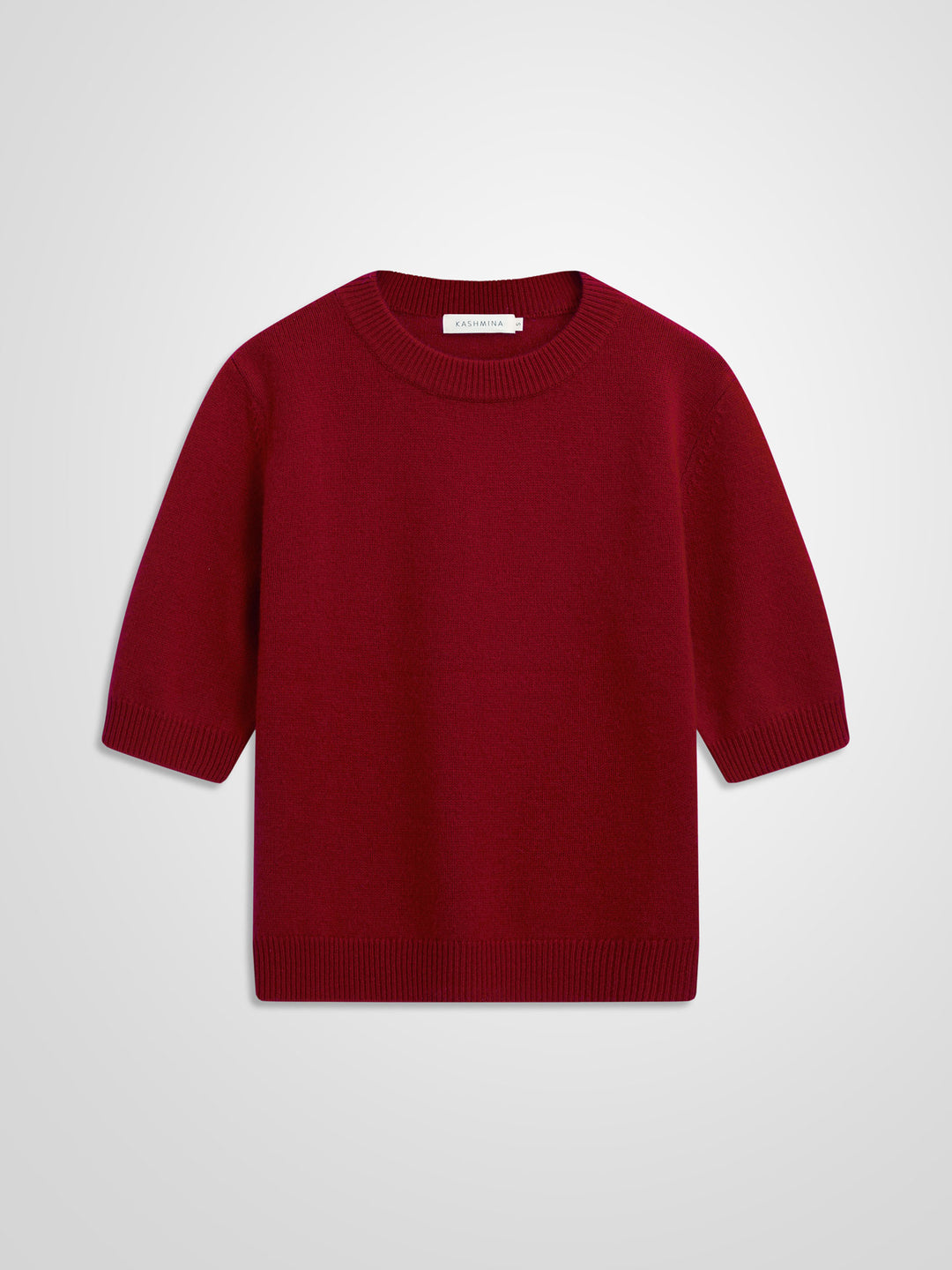 Short sleeved cashmere sweater "Aase" in 100% pure cashmere. Scandinavian design by Kashmina. Color: Aroma Red.