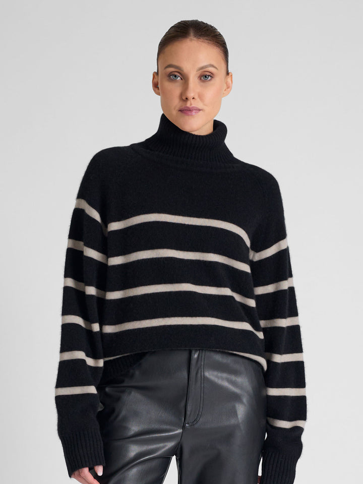 Turtleneck cashmere sweater with stripes. 100% pure cashmere. Scandinavian design by Kashmina. Color: Black, ginger.