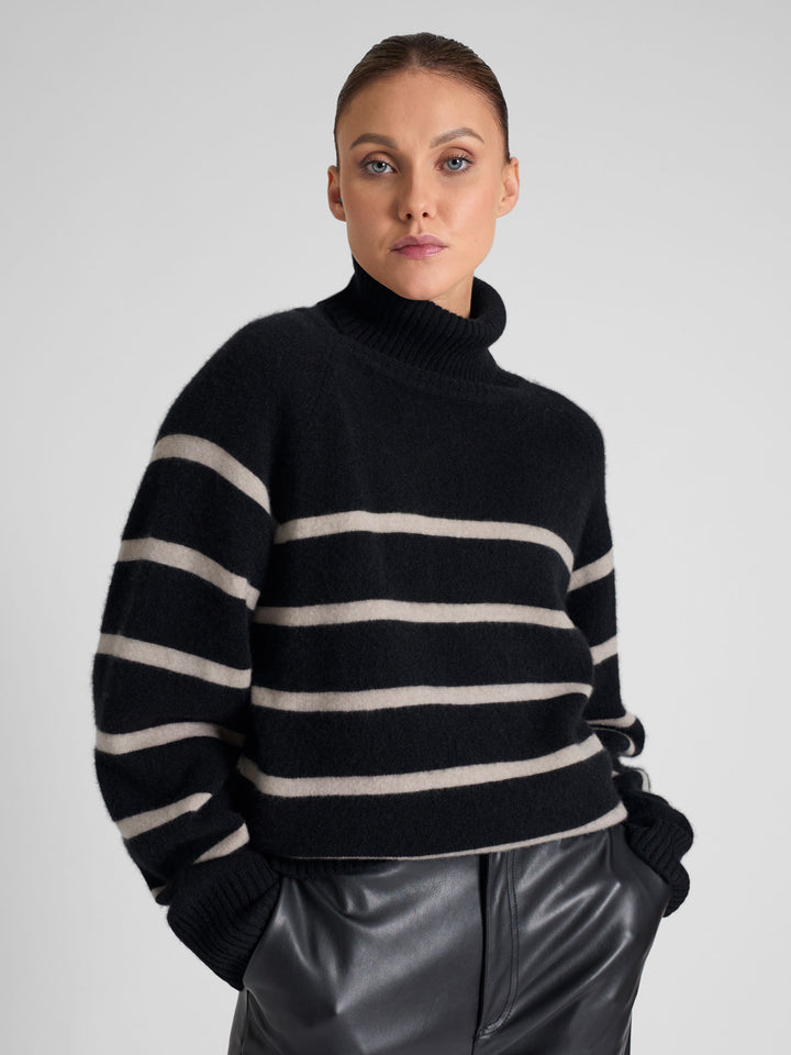 Turtleneck cashmere sweater with stripes. 100% pure cashmere. Scandinavian design by Kashmina. Color: Black, ginger.