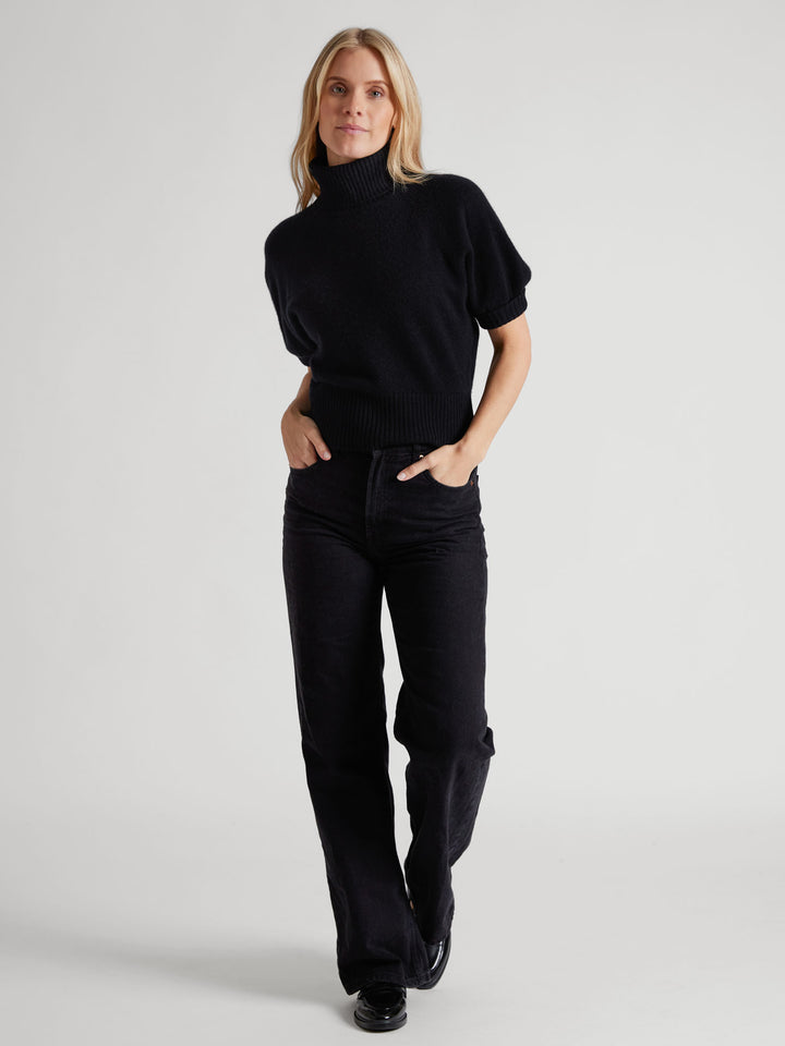 Short sleeved turtle neck cashmere sweater. Color Black. Scandinavian design by Kashmina