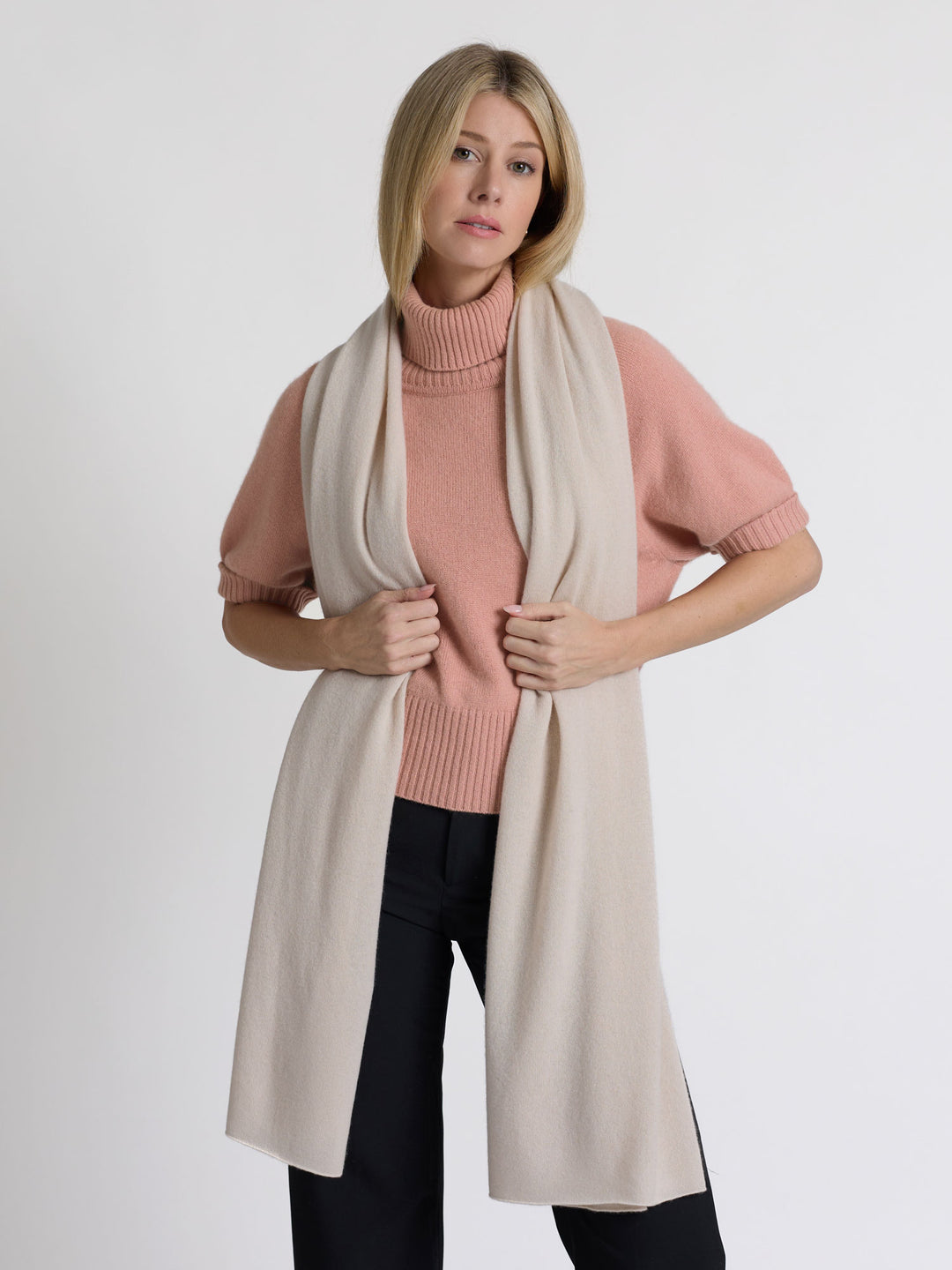 Short sleeved turtle neck cashmere sweater. Color Peachy Pink. Scandinavian design by Kashmina