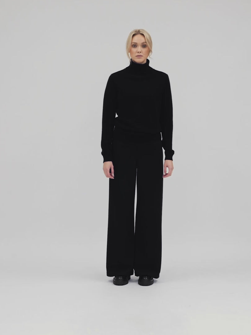 Turtleneck cashmere sweater, black color. 100% pure cashmere. Scandinavian design by KASHMINA of Norway.
