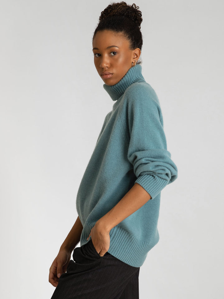 Turtle neck cashmere sweater Milano in 100% cashmere by Kashmna, color arctic blue/green. Scandinavian design.