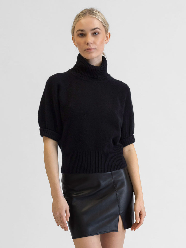 Short sleeved turtle neck cashmere sweater. Color Black. Scandinavian design by Kashmina