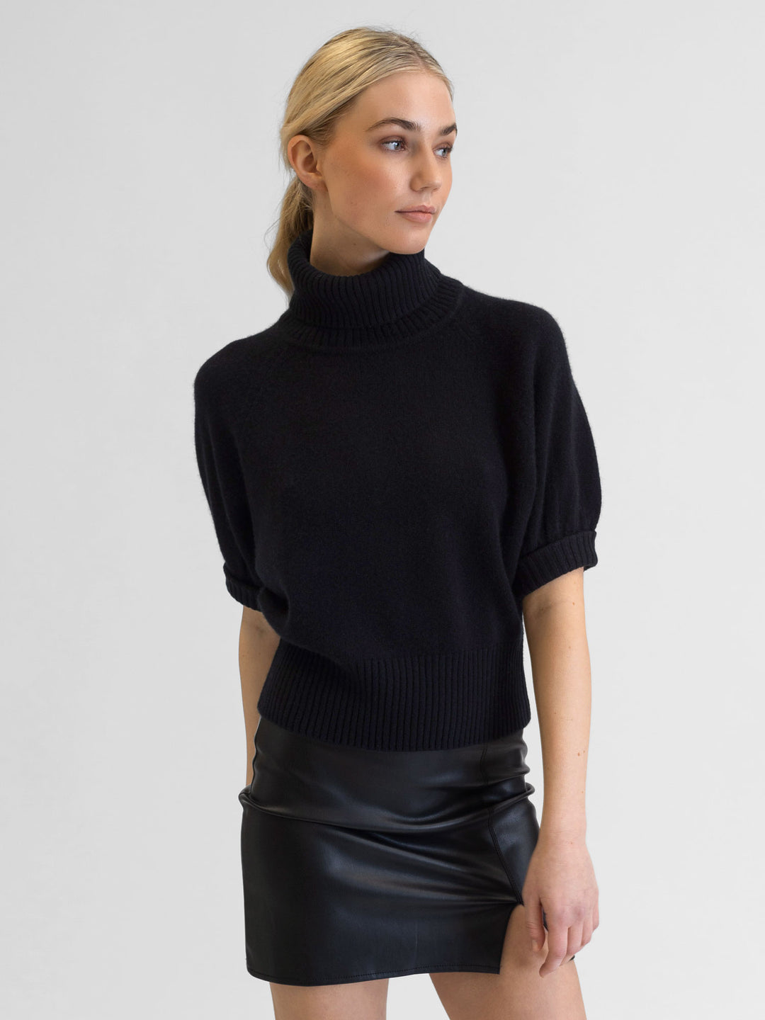 Short sleeved turtle neck cashmere sweater. Color Black. Scandinavian design by Kashmina