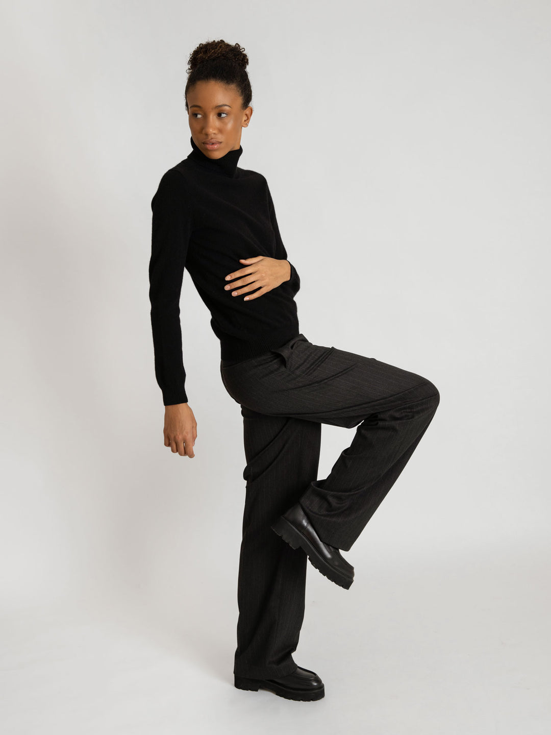 Turtleneck cashmere sweater, black color. 100% pure cashmere. Scandinavian design by KASHMINA of Norway.