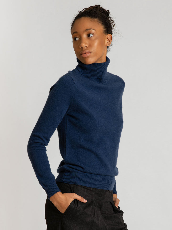 Turtleneck cashmere sweater, mountain blue color. 100% pure cashmere. Scandinavian design by KASHMINA of Norway.