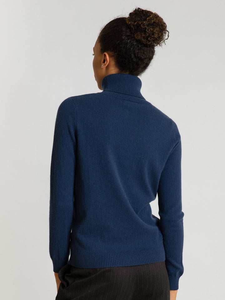 Turtleneck cashmere sweater, mountain blue color. 100% pure cashmere. Scandinavian design by KASHMINA of Norway.