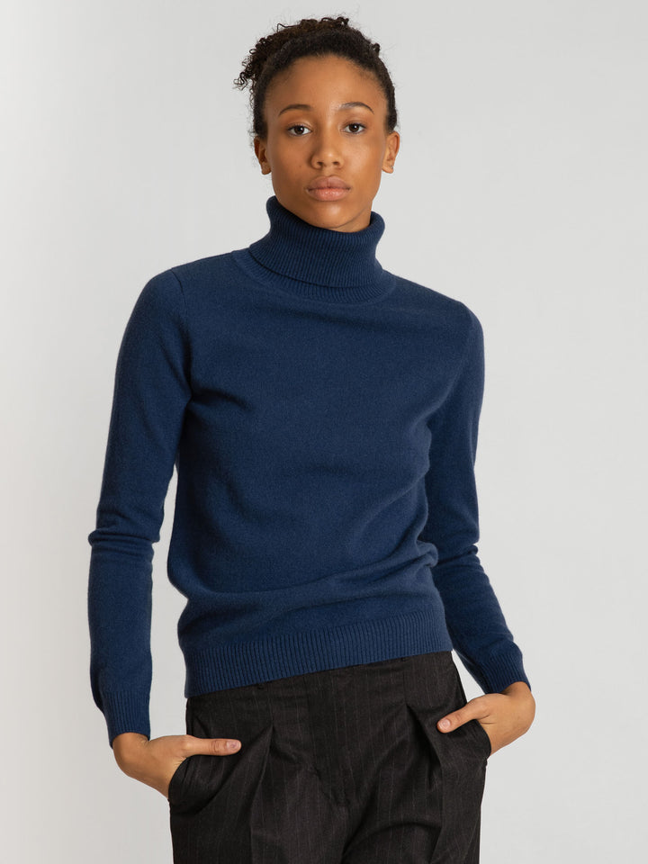 Turtleneck cashmere sweater, mountain blue color. 100% pure cashmere. Scandinavian design by KASHMINA of Norway.