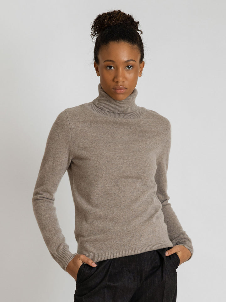 Turtleneck cashmere sweater, toast (light brown) color. 100% pure cashmere. Scandinavian design by KASHMINA of Norway.