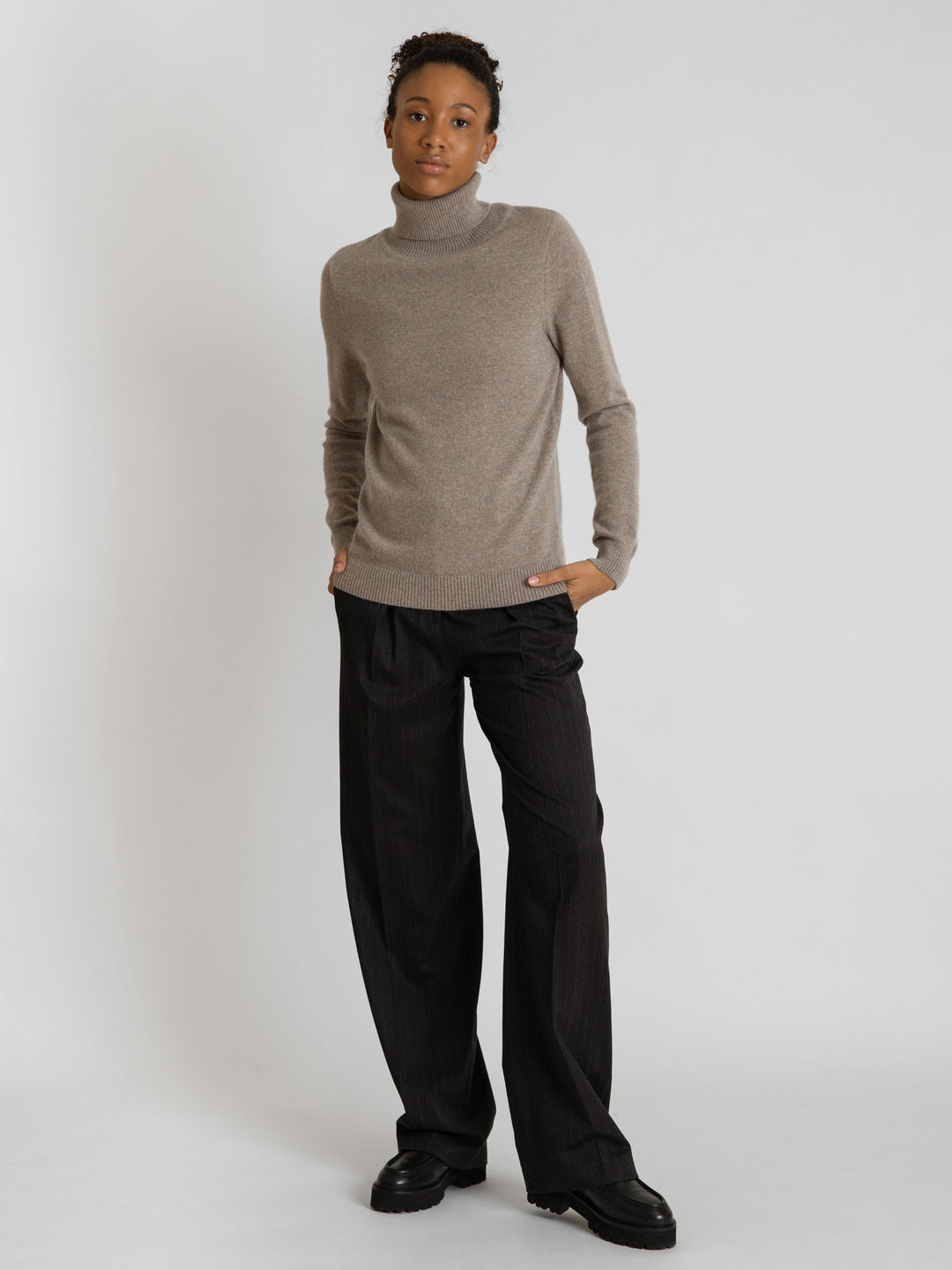 Turtleneck cashmere sweater, toast (light brown) color. 100% pure cashmere. Scandinavian design by KASHMINA of Norway.